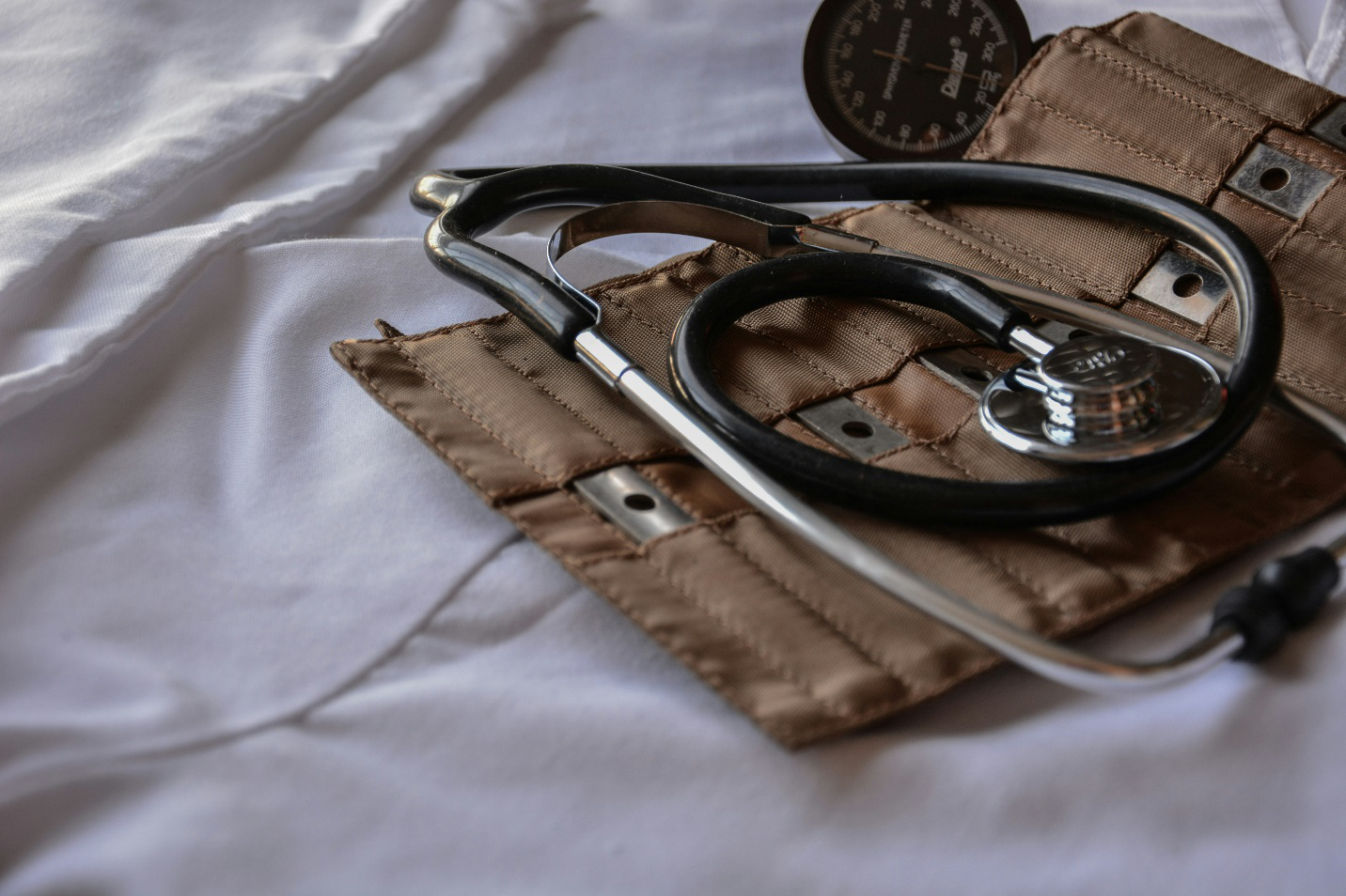 A black stethoscope, representing the holistic and individualized care provided by functional medicine for fatigue in Georgia.
