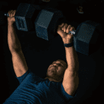 A man lifting dumbbells