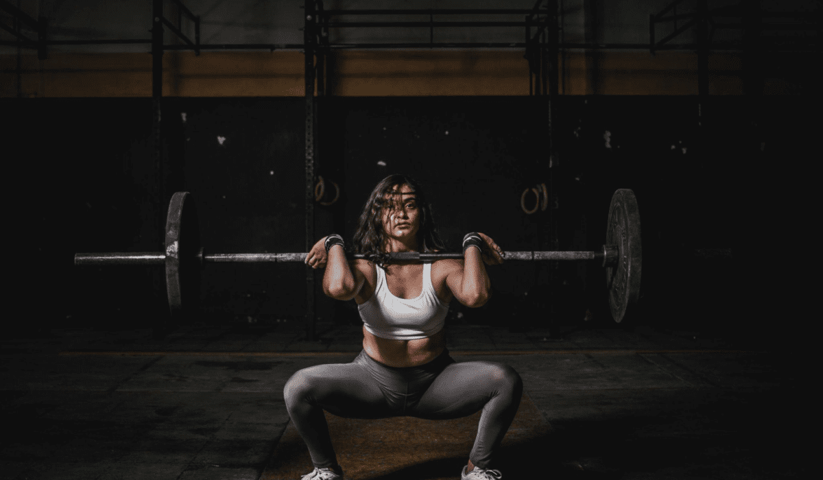 a person lifting a barbell
